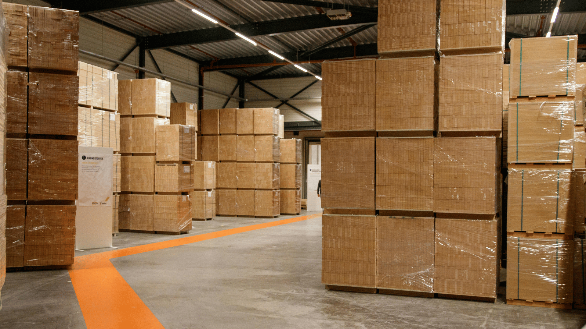 Warehouse team assembling and staging kitted inventory on Stacket WMS