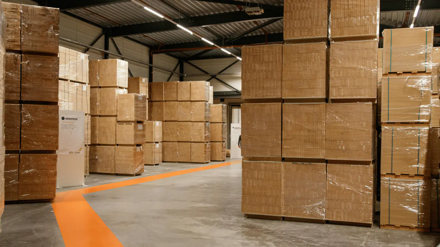 Warehouse team assembling and staging kitted inventory on Stacket WMS