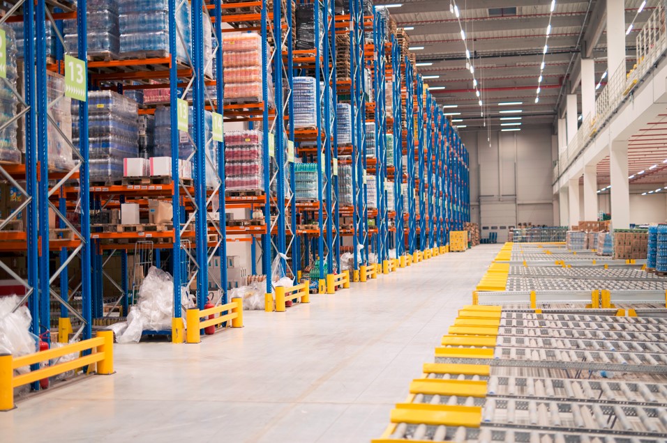 Warehouse racking and conveyor lanes running on Stacket WMS